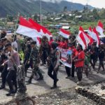 Peringatan Hari Lahir Pancasila, 800 Warga Puncak Jaya Kirab Bendera 50 Meter